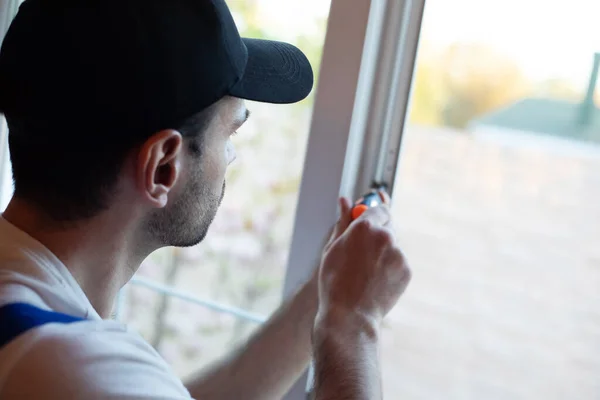 Young Professional Worker Man Uniform Suit Installing Window Help Tools — Foto de Stock