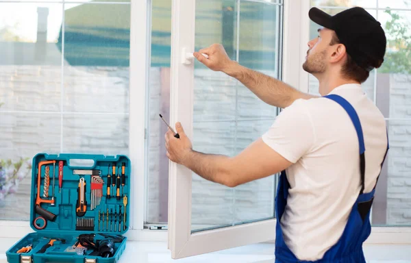 Young Professional Worker Man Uniform Suit Installing Window Help Tools — Fotografia de Stock