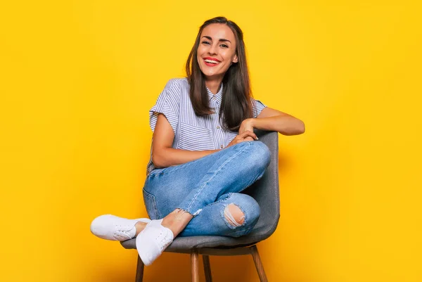 Cute Smiling Stylish Woman Sitting Chair Posing Isolated Yellow Background — Foto de Stock