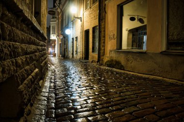 Rainy Night on a Cobblestone Street in Tallinn Old Town
