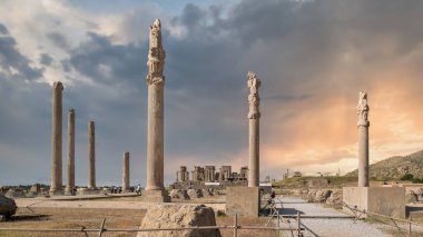 Persepolis, Iran - May 2019: Ruins of Persepolis, the capital of the Achaemenid Empire later destroyed by Alexander the great. Historical city of Persepolis during sunset in Shiraz, Iran