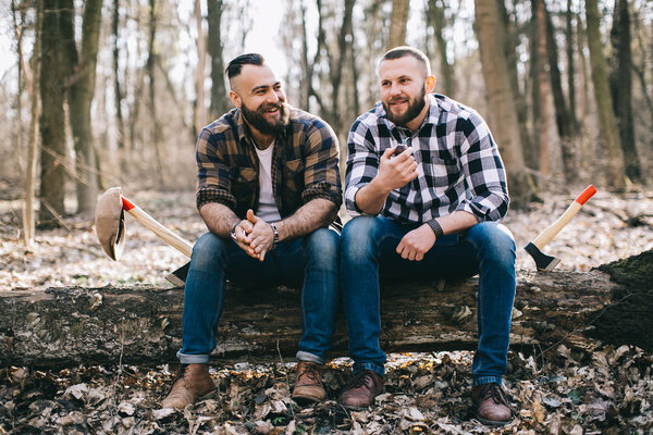 bearded men in a forest