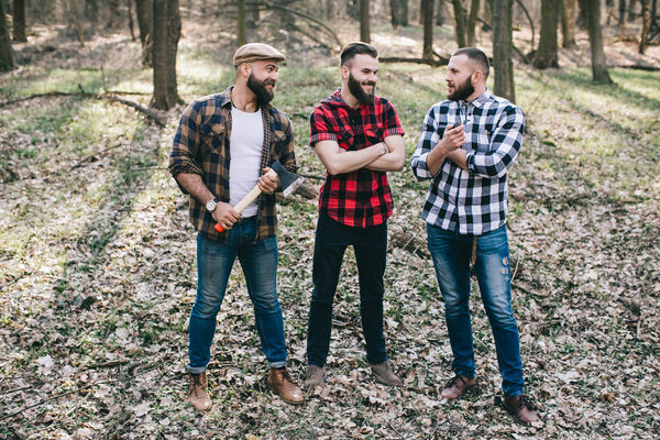 bearded men in a forest