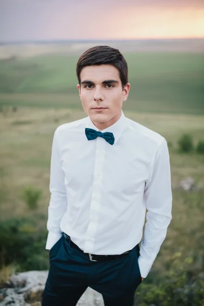 Young groom in mountains — Stock Photo, Image