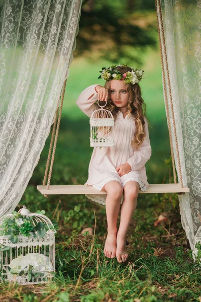 Little girl swinging — Stock Photo, Image