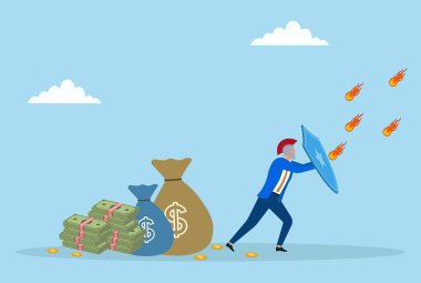 Parasını düşen ateş toplarından korumak için kalkan kullanan bir iş adamının temsili mali güvenliği, risk korumasını ve ekonomik tehditlere karşı savunmayı simgeliyor.