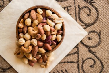 Deluxe Mixed Nuts, cashew, almond and peanuts. clipart