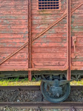 Lodz, Poland, May 01, 2025. Historic red brick industrial building foundation with decorative ceramic tile detail at former factory site in Lodz. High quality photograph
