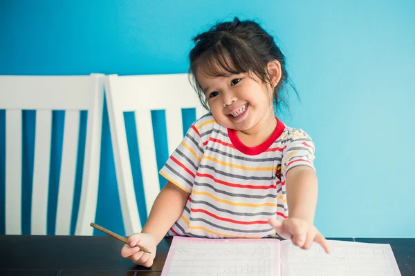 Asian young girl children happy doing her homework people, family concept Stock Picture