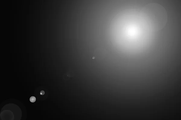 Цифровые линзы вспышки в черном фоне горизонтальной рамки теплый и абстрактный фон — стоковое фото