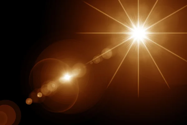Dijital lens flare siyah arka plan yatay çerçeve sıcak ve soyut arka planda