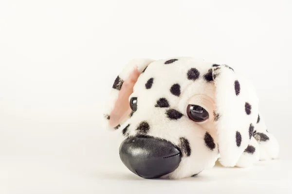 Kleines Plüschtier in Form eines Hundes. — Stockfoto
