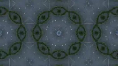 Tekrarlayan Geometrik Şekiller ve Simetrik Tasarımı Olan Kaleydoskop Soyut Deseni.