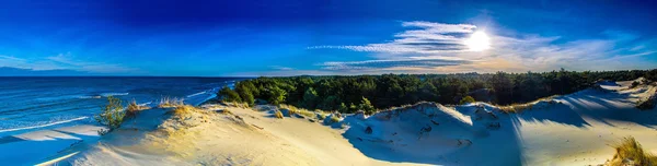 Панорама сходу сонця в піщаних дюнах — стокове фото