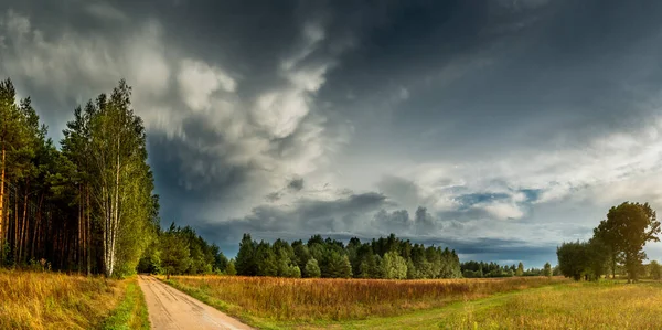 Dramatic view of a cloud over a field, horizontal cloud formatio