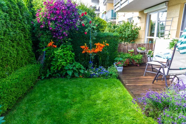 Beautiful backyard garden, full of flowers