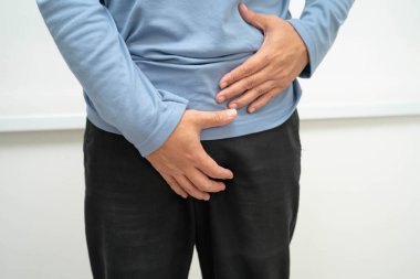 Fıtık, Asyalı erkek mide ağrısı, karın ağrısı ve üroloji problemi..