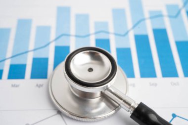 Çizelge üzerinde steteskop veya grafik kağıdı, Finansal, hesap, istatistik ve iş verileri tıbbi sağlığı.
