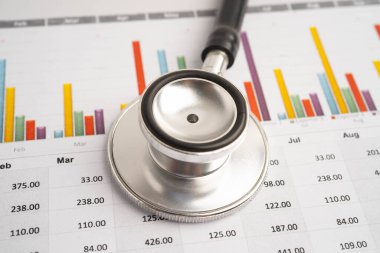 Çizelge üzerinde steteskop veya grafik kağıdı, Finansal, hesap, istatistik ve iş verileri tıbbi sağlığı.