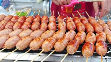 Grilled Isan Sausage on Charcoal.