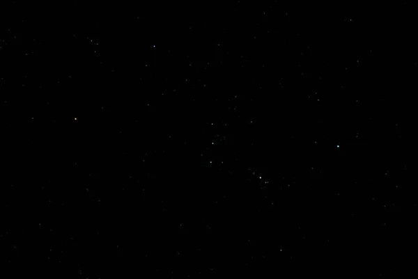 the black night sky with many stars and the North Star and Big Dipper constellation