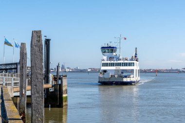 Esbjerg, Denmark - 28 May, 2021: view of the ferry between Nordby and Esbjerg clipart