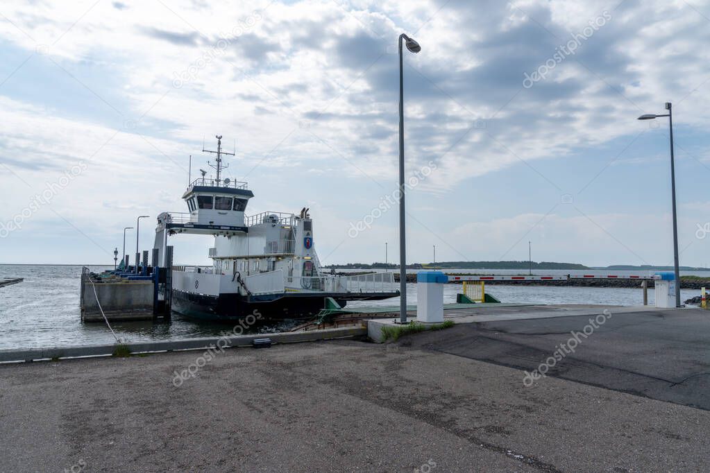 Thy, Denmark - 3 June, 2021: view of the Feggesund ferry leaving the harbor in Thy