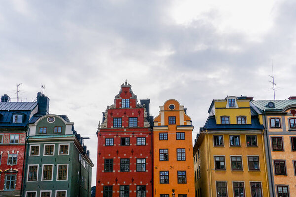 Stockholm, Sweden - 23 June, 2021: view of the colorful Stortorget Square houses in downtown Stockholm