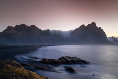 view of the beach at Stokksnes and the iconic Vestrahorn in southeastern Iceland at sunrise