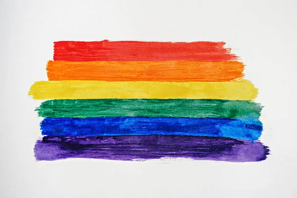 Lgbtqゲイの虹色の縞模様プライド トップビュー 白い背景にストロークを描いたLbtフラグ コンセプト — ストック写真