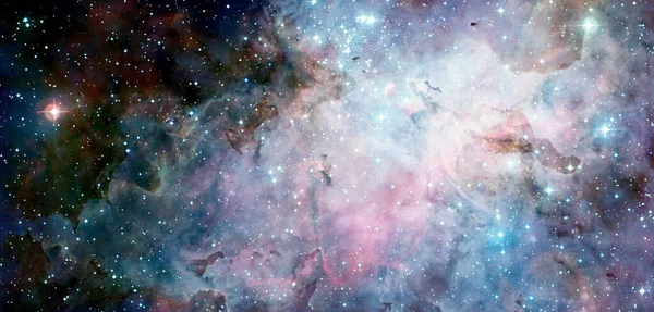 Nebula and stars in cosmos space. Elements of this image furnished by NASA.