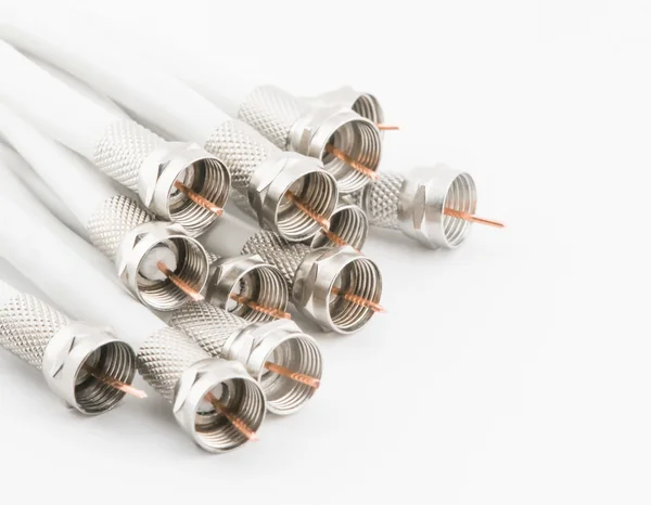 Nuts on the coaxial cable on a white background — Stock Photo, Image