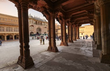 Amer Fort medieval architecture with view of tourists at Jaipur Rajasthan India
