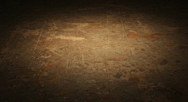Koyu renkli ahşap bir yüzeye yakın çekim. Görünür çizikler ve soyulmuş boyalar grunge etkisi yaratıyor..