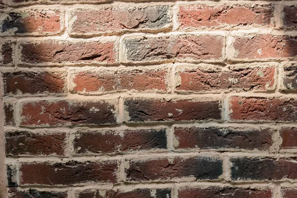background of old brick wall with sun shadow