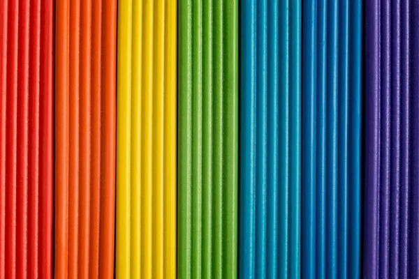 Rainbow colors of modeling clay. Multicolored plasticine bars background.