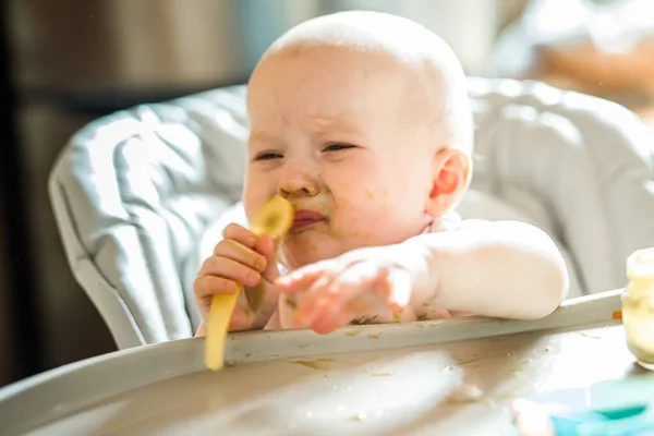 Months Old Baby Girl Home High Chair Eating Tasty Food — стоковое фото