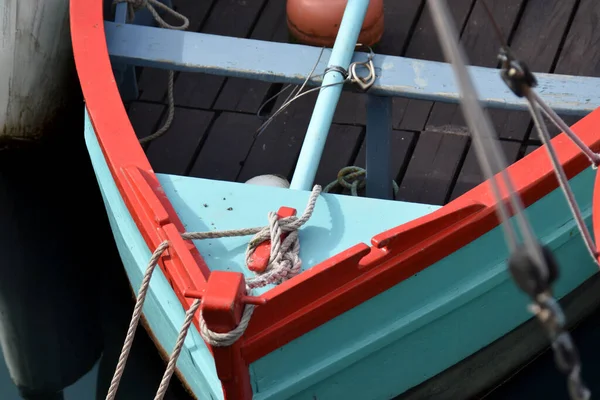 old boat with bright colors