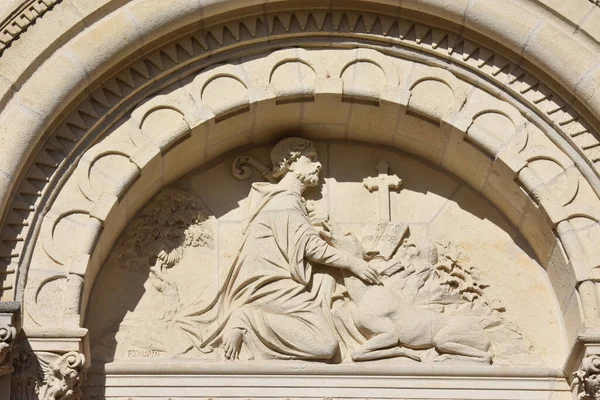 statue on the pediment of Our Lady of Good Help in Pornic