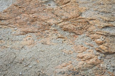 Gri ve kahverengi tonlarda doğal kaya dokusu.