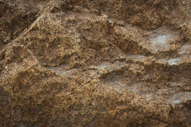Doğal yüzey desenli ayrıntılı granit kaya dokusu.