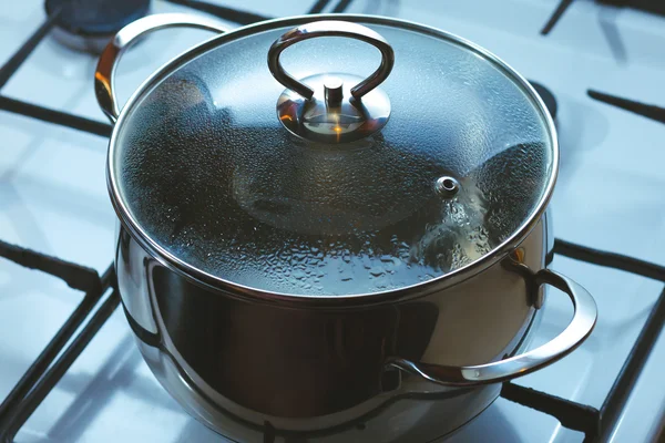 Covered pan with water — Stock Photo, Image