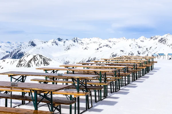 beer bench in the snow mountains