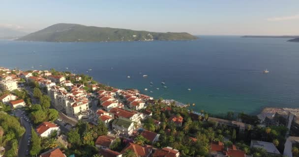 Снимки с воздуха Черногории Herceg Novi, Mediterranean, Adriatic sea, Bay Marine, port, beach, palm trees — стоковое видео