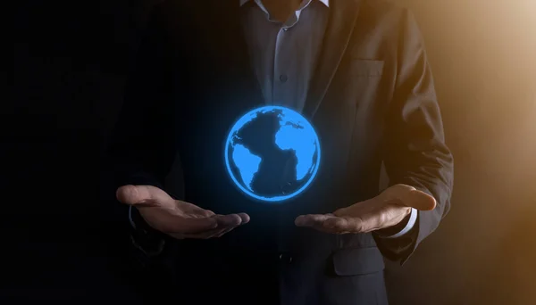 Businessman man hand holding Earth icon , digital globe.