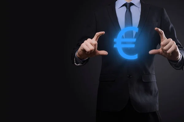 Businessman Holds Money Coin Icons Eur Euro Dark Tone Background — Stock Photo, Image