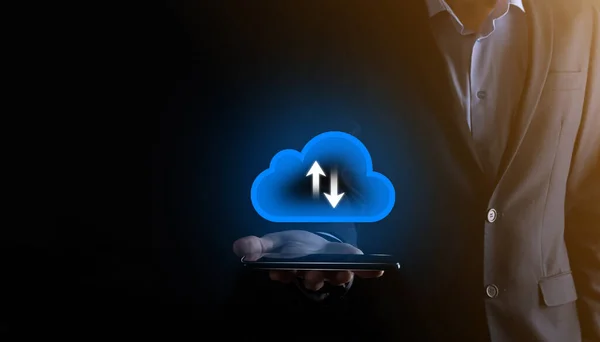 Businessman hold cloud icon.Cloud computing concept - connect smart phone to cloud. computing network information technologist with smart phone.Big data Concept