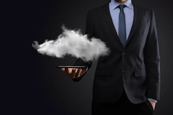 Businessman man hand holding cloud.Cloud computing concept, close up of young business man with cloud over his hand.The concept of cloud service