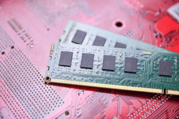 Computer memory RAM on motherboard background . Close up. system, main memory, random access memory, onboard, computer detail. Computer components . DDR3. DDR4. DDR5
