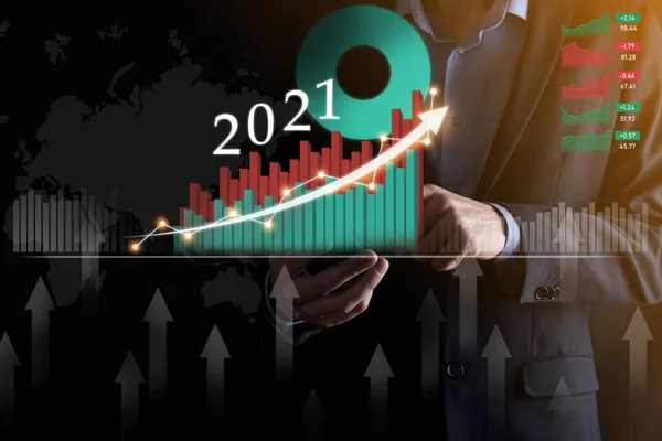 Plan business positive growth in year 2021 concept. Businessman plan and increase of positive indicators in his business, Growing up business concepts